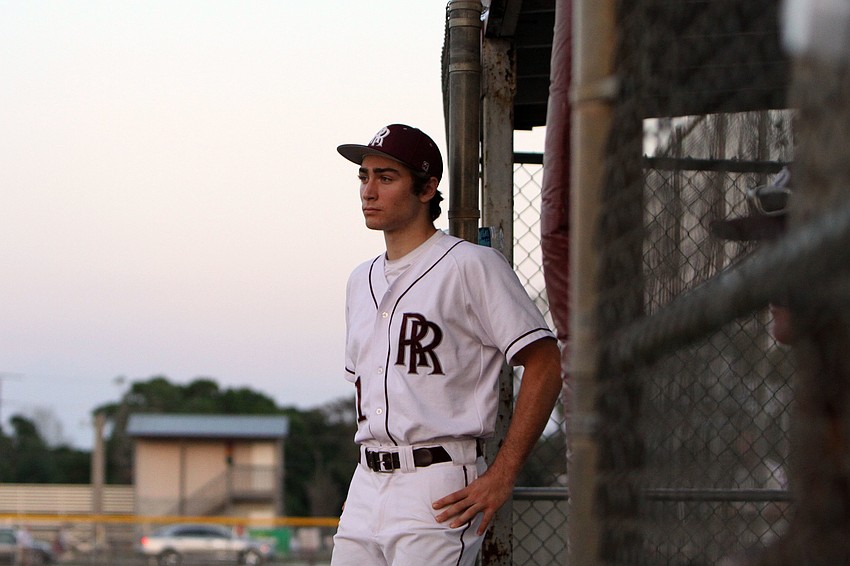 Riverviewâ€™s Lukas Douglas, No. 11, watches his teammate at bat from right outside the dugout.