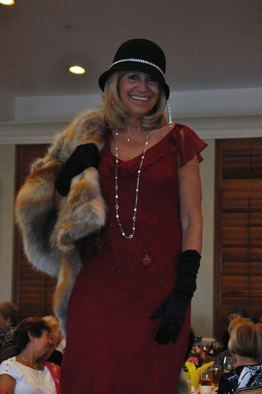 Maria Aiello models a 1920s ensemble.