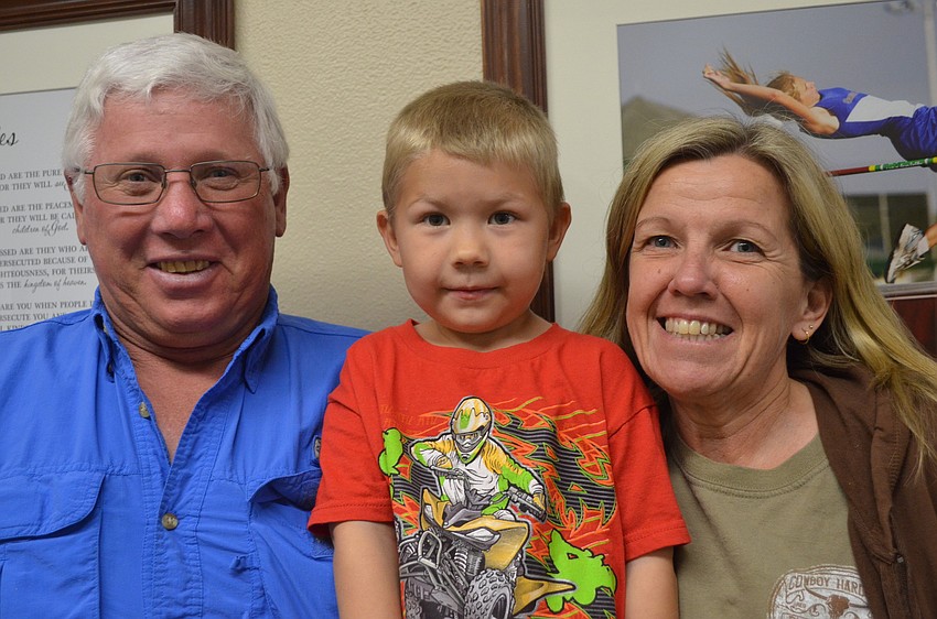 Dan and Penny Miller with their grandson Hunter Muncy