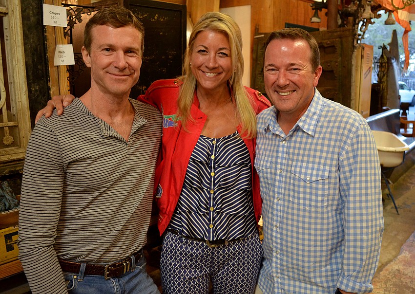 Bix and Gretchen Mannion joke with Peter Acker.