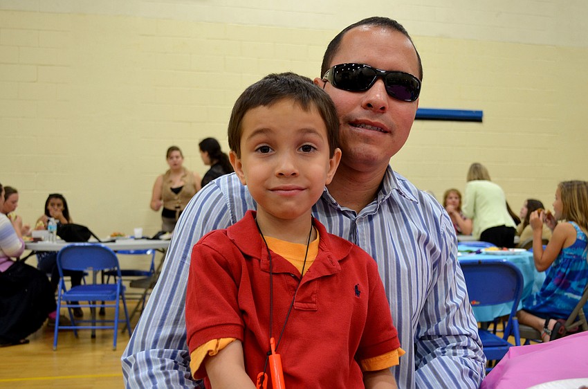 Diego Gomez with his son, Samuel