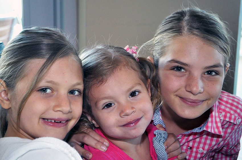 Alia, 7, Brie, 2, and Emma Bivona, 10