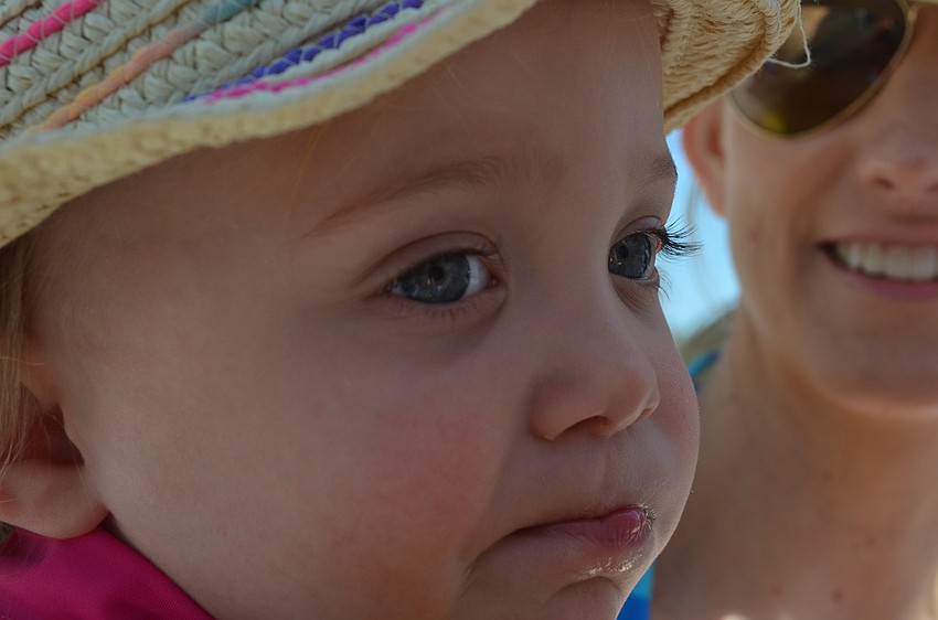 Cate Vertkayn said hello to the Easter bunny with her mother Brandy.