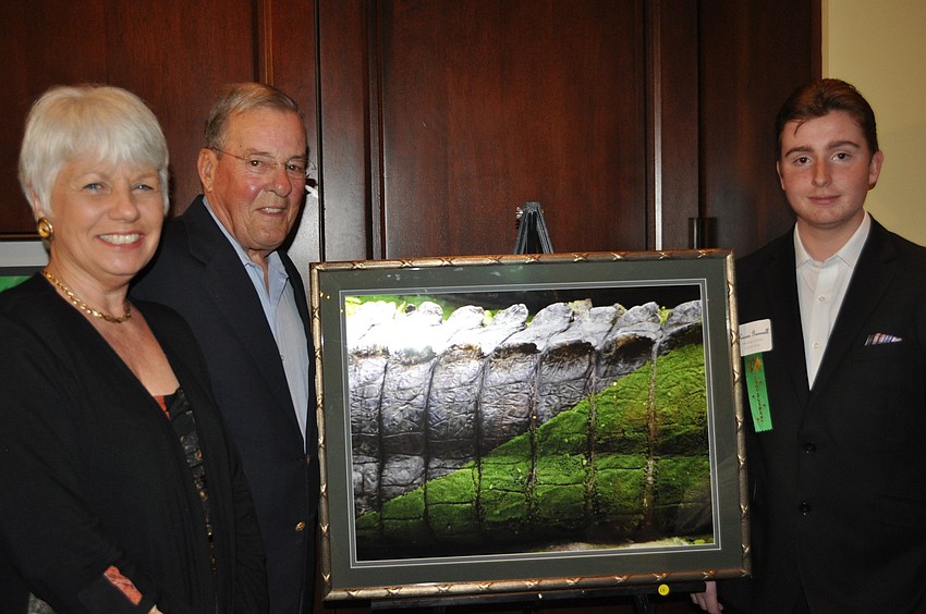 Kieren Gunnell, a sophomore at the Manatee School of Arts, took a picture of an alligator with algae on its tail at a zoo in Tampa. Barbara and Ed Jennings appreciated the work.
