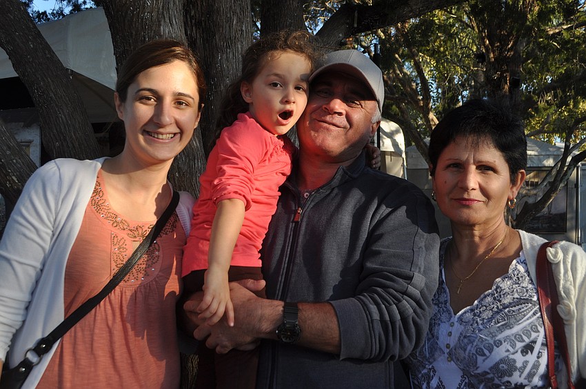 Danielle Poinsett with daughter, Ella, and Stavri and Tefta Koci