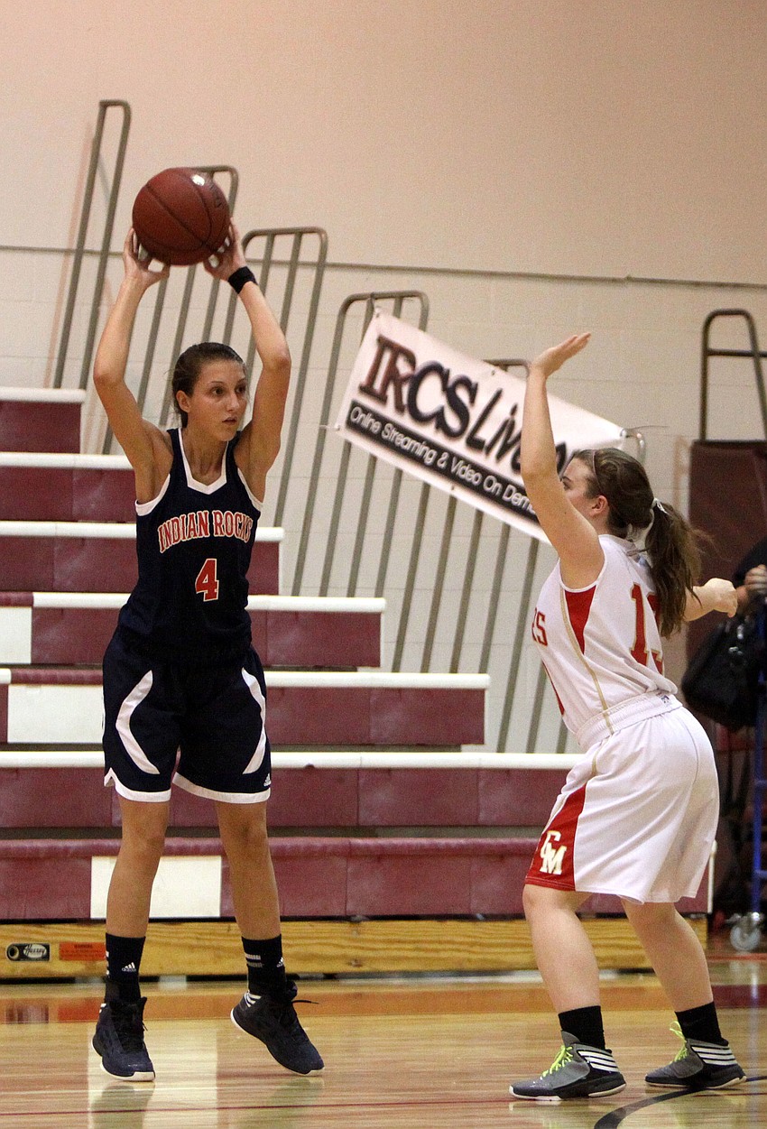 Cardinal Mooneyâ€™s Quinn Incardona, No. 13, guards Indian Rocksâ€™ Hayley Morten, No. 4.