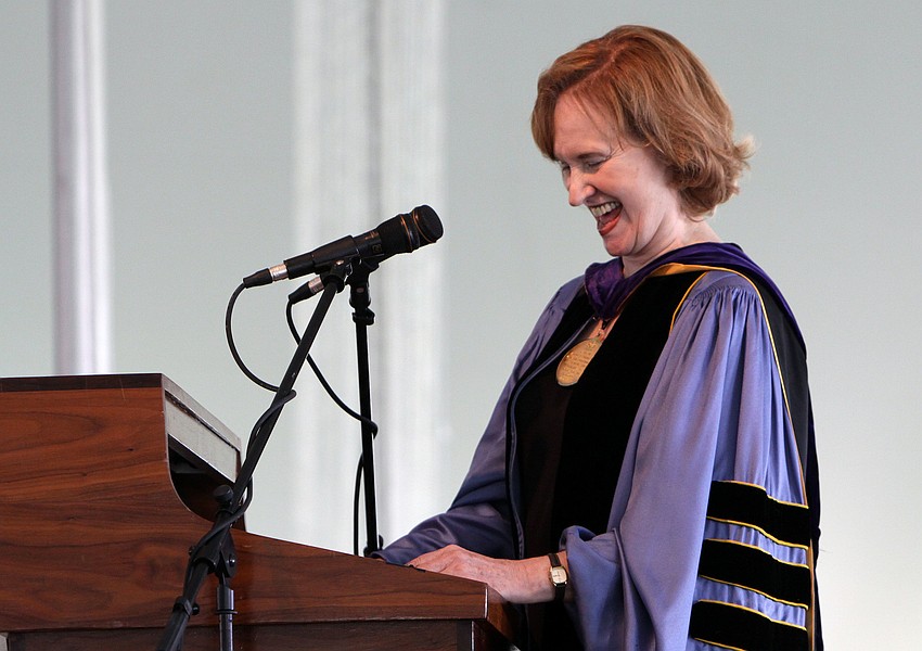 Joanne V. Creighton laughs after someone in the crowed yelled out â€œwe do!â€ after she started off her commentary on Dr. Donal Oâ€™Shea saying that she felt like she was â€œgiving the groom awayâ€.