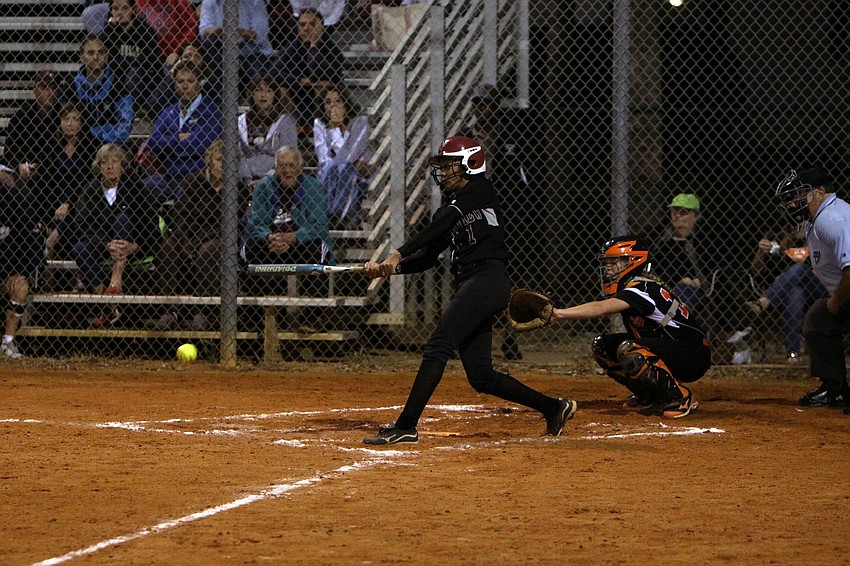Riverviewâ€™s Victoria Groves, No. 1, hits the ball.