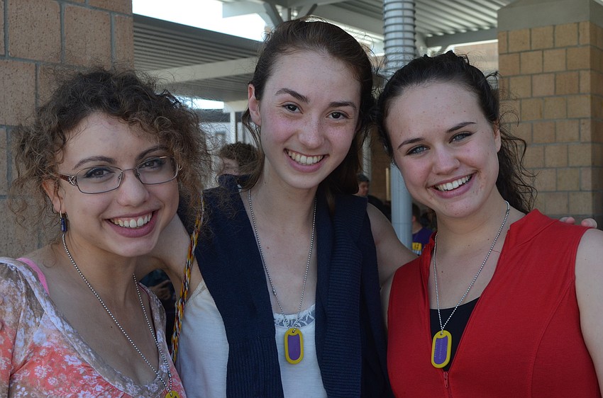 Seniors Erica Janko, Olivia Goodfriend and Carolyn Silverman all wear gold dog tags symbolizing a 4.0 GPA or higher. â€œSeeing all of my successful peers is the most exciting, â€œ said Goodfriend.