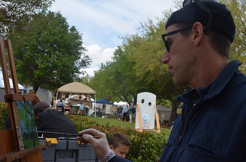 Booker High School art teacher Steve Strenk painted the landscape with some students.