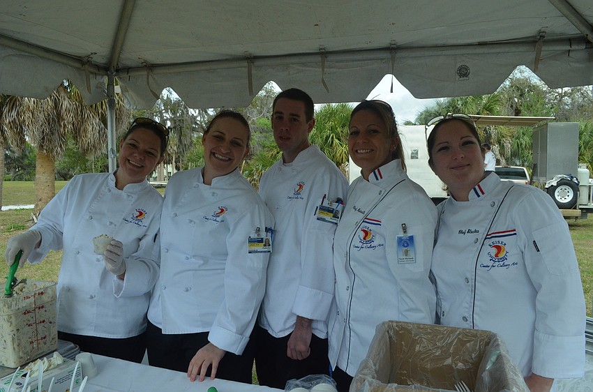 Students Melissa Skinner, Zuleyka Llinas, and Matt Hill and instructors Nicole Martinelli and Samantha Slechta, of Keiser University Center for Culinary Arts, made the side dishes.
