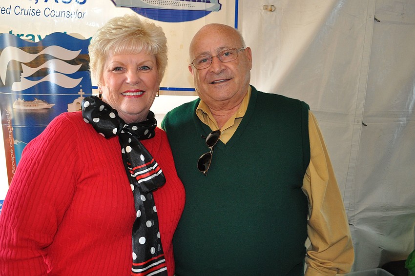 Vicky Getman, of Getman Travel, with Nick Gigliotti, of Sunshine State Tags