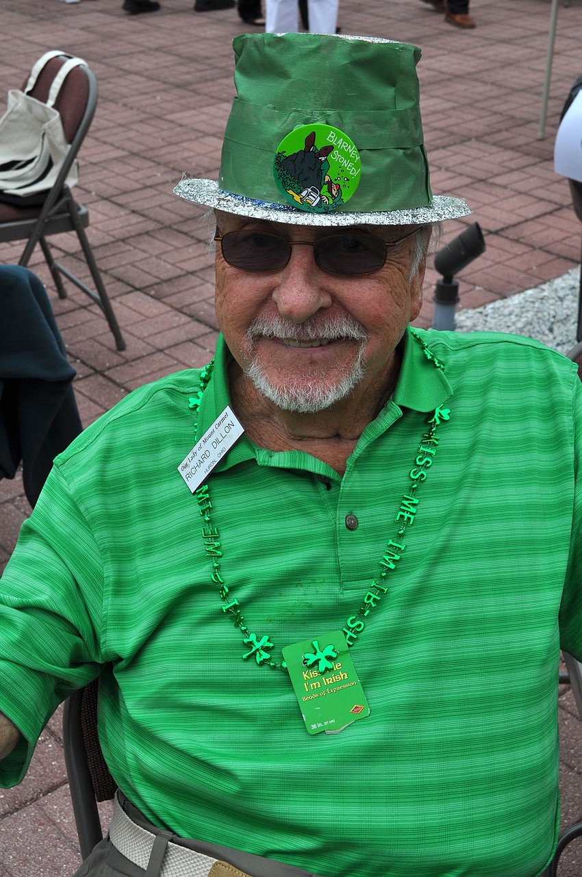 Richard Dillon had help from his daughter decorating his hat for the party.