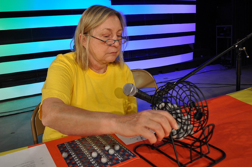 Dr. Donna Hart, art teacher, called the numbers.