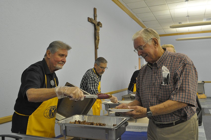 Ed Krepela serves Harold Engelke