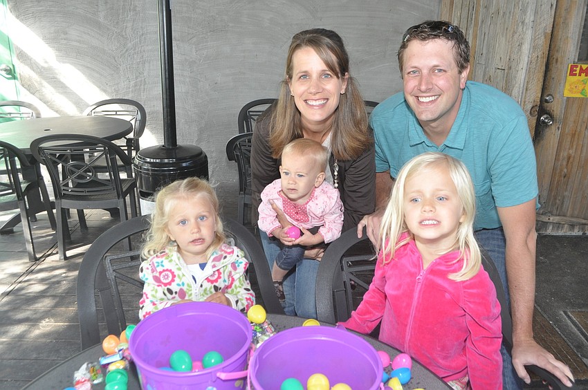 Lacey and Aaron Knoll with Taylor, 2, Londyn, 1, and Addi, 4