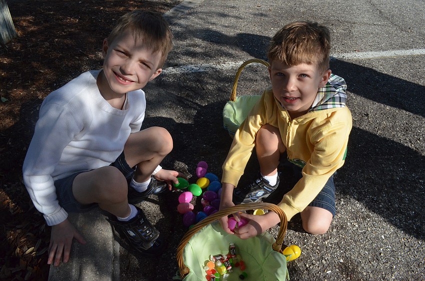 Brothers Joe and Jacob Sievert open eggs to see what they found.