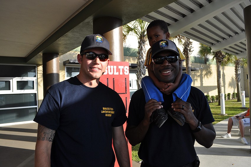 Josh Breitwieser with Jerard Vonador and his son, Jerard II. Breitwieser and Vonador attend the MTI Law Enforcement Academy.