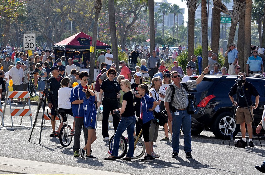 Hundreds of spectators gathered along U.S. 41 to watch.