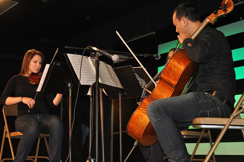 Celia Sperotto, Sophavy Vann and Jessica Fenimore (not pictured), all Braden River teachers, played a string trio.