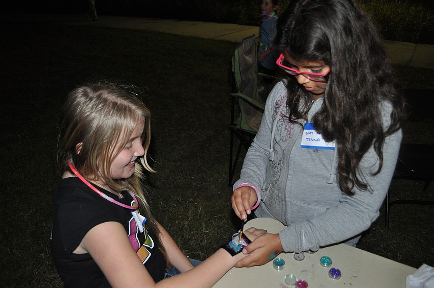 Lucy Crank received body art from Jenna Hernandez.