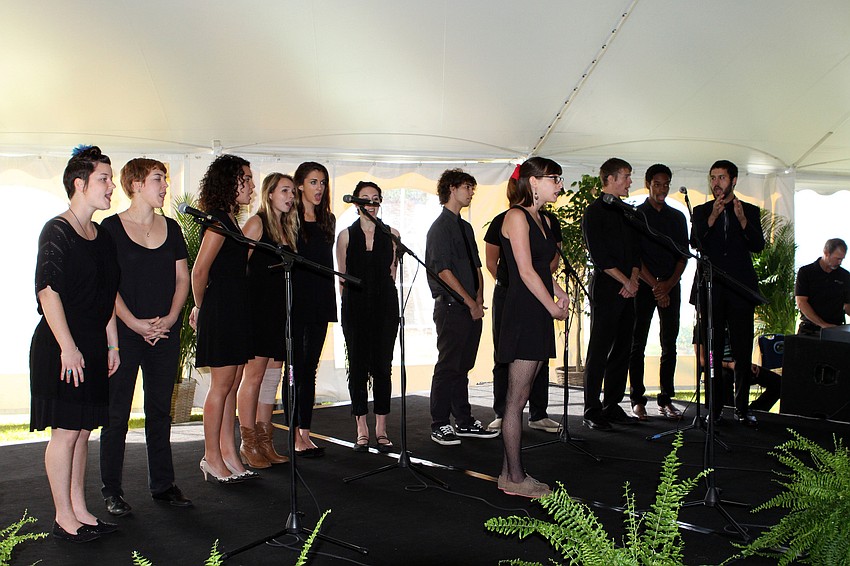 Acapellago sing â€œHow Can I Keep from Singingâ€ and â€œSitting on the Dock of the Bayâ€