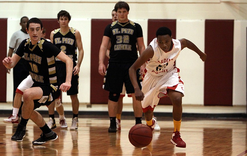 St. Petersburg Catholicâ€™s Mike Fridella, No. 10, tries to catch up with Cardinal Mooneyâ€™s Blair Perry, No. 23, after Perry stole the ball.