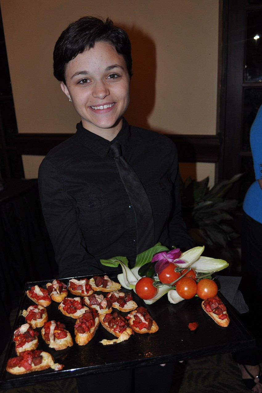 Allison Dygert, of the Polo Grill, passed chorizo with roasted red pepper.