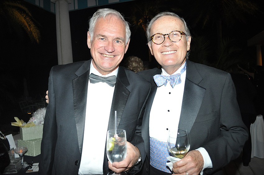 Bill Wood and Bob Schauer. Schauerâ€™s wife, Linda, bought his patriotic bow tie because, â€œShe was tired of (me) wearing black.â€
