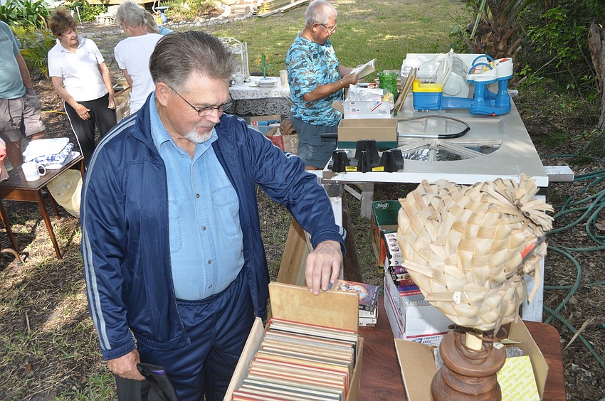 Greene Tussey browses books.