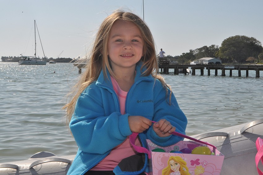 Addison Cross, 4, arrived at the egg hunt by catamaran.