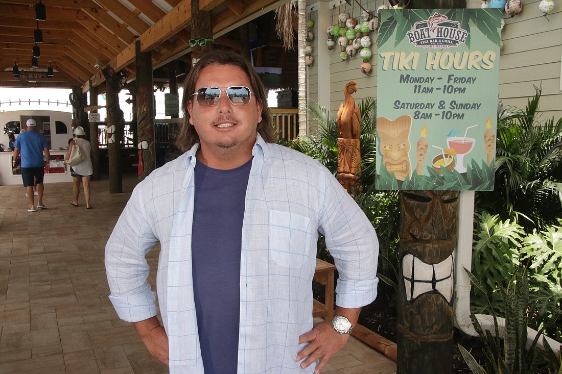 Jim Jett Photo. Zak Kearns, vice president of Kearns Restaurant Group, at the new The Boathouse Tiki Bar & Grill at Sweetwater Landing Marina in Fort Myers.