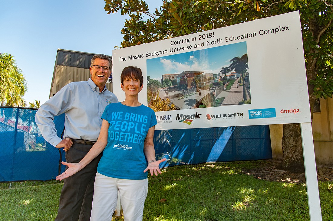 Lori Sax. Carl Callahan, Bradenton city administrator and economic development director, and Johnette Isham, Realize Bradenton executive director, in front of the Mosaic Backyard Universe to be built at South Florida Museum.