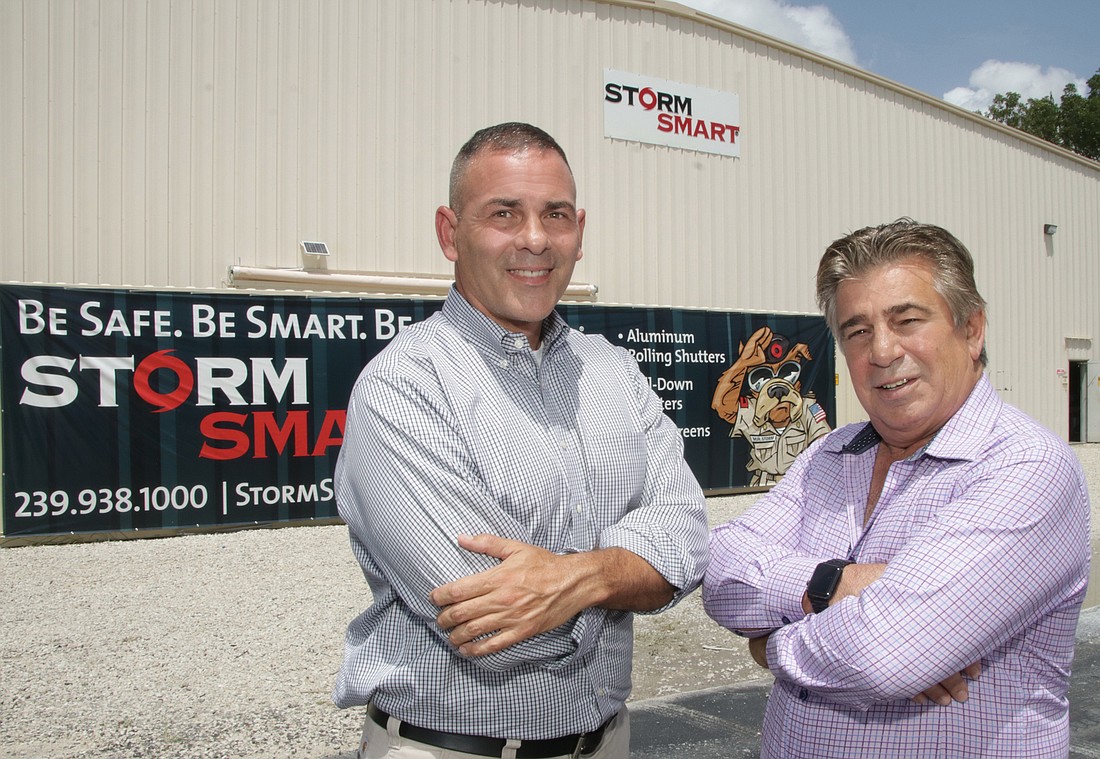 John Boland (left) and Brian Rist are executing a succession plan at Storm Smart that allows the company to efficiently increase production and explore geographic growth. JimJett.com photo