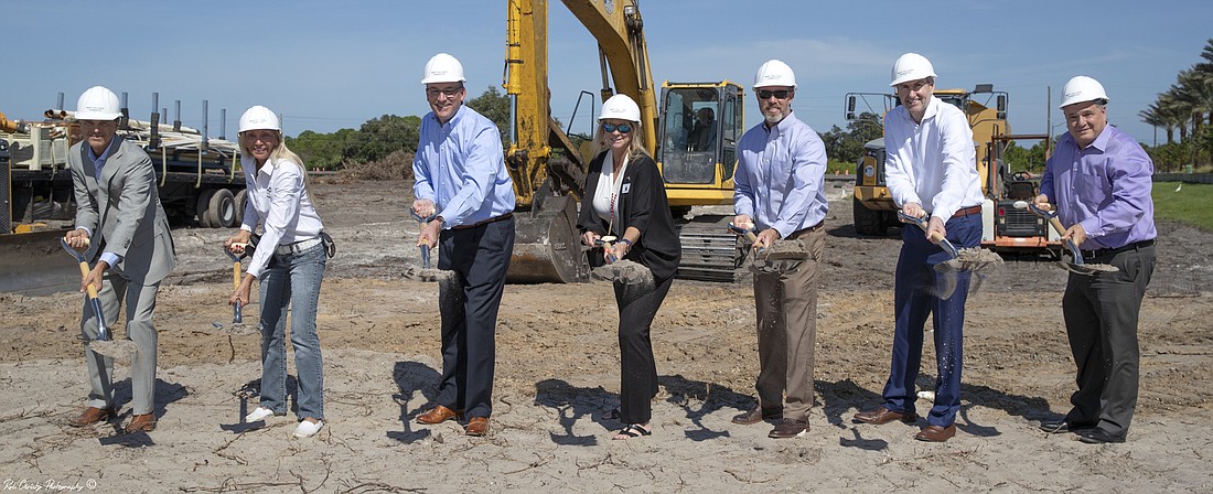 Courtesy, Rob Christy Photography. West Villages, North Port and Sembler officials at the groundbreaking of a new plaza in south Sarasota County to be anchored by Publix.Â