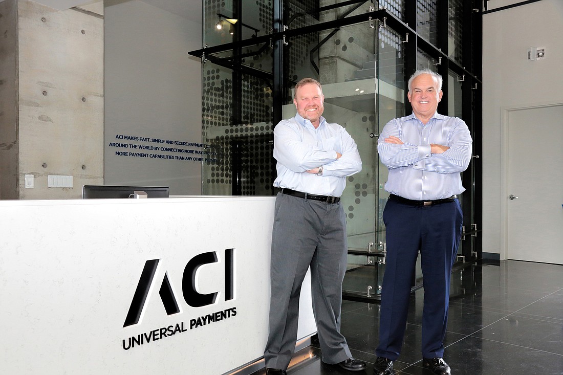 ACI Worldwide COO Craig Saks (left) and CEO Phil Heasley are leading the Naples-based electronic payment company into the industry&#39;s next innovation: instant payment. Stefania Pifferi photo
