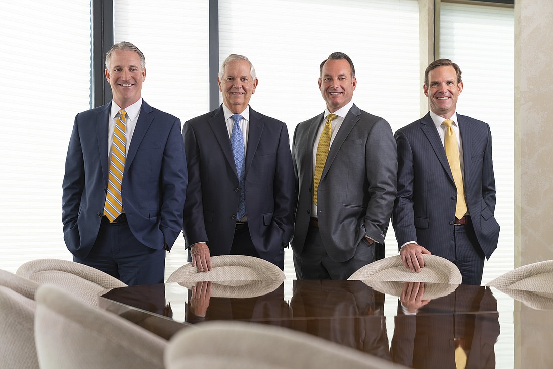 Bank of Tampa executives, from left, Corey Neil, Bill West, Scott Gault and David Moore. Courtesy photo.