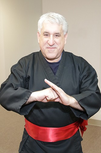 Kung fu san soo eighth-degree black belt master Neil Kagan says his martial art isn&#39;t  for sport, but rather purely street fighting self-defense. JimJett.com photo