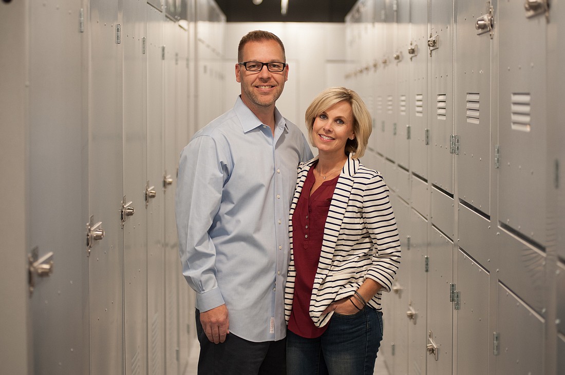 Lori Sax. Brett and Paula Laurvick built out the interior of Cellar Fifty-Five in Sarasota with individual lockers for wine aficionados.