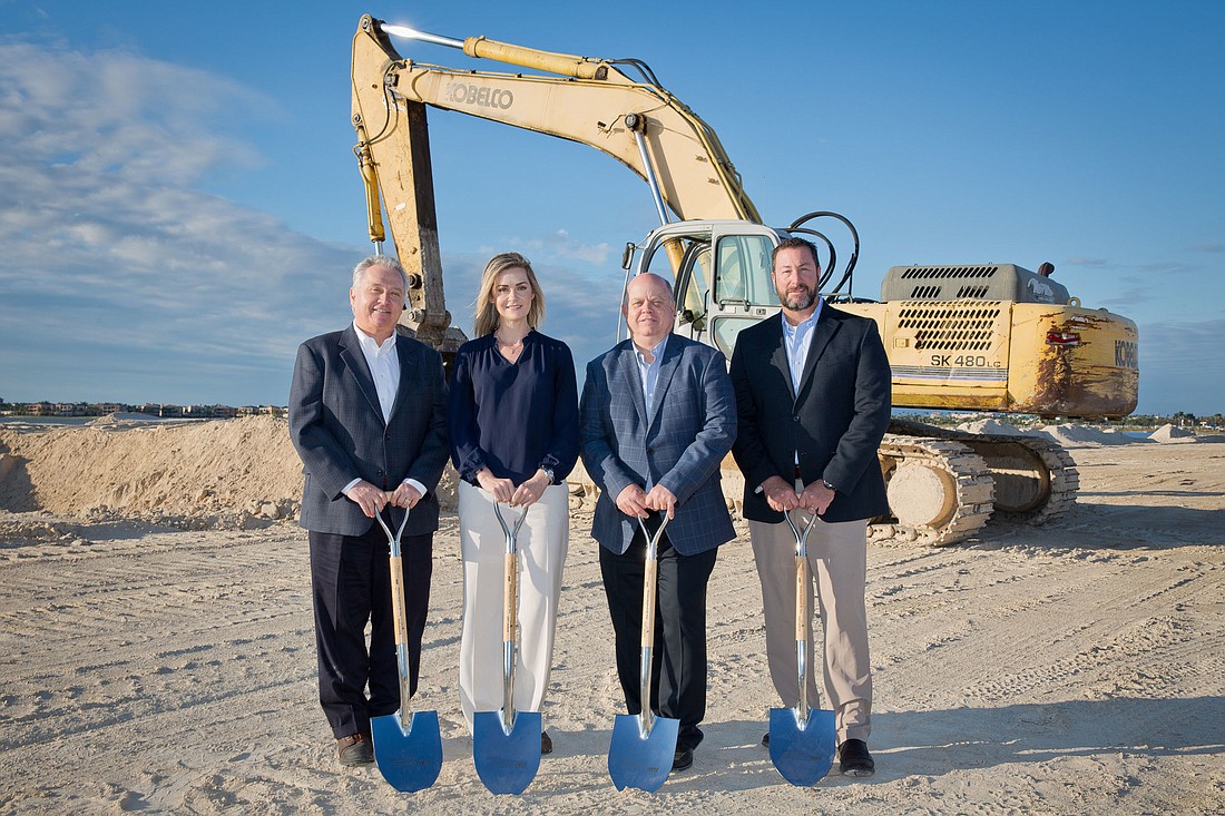 From left, Russ Palka, Cammie Longenecker, Andy Sorensen and Justin Laurie of Taylor Morrison with ceremonial shovels at the 778-acre Esplanade Lake Club in Fort Myers. Courtesy Taylor Morrison