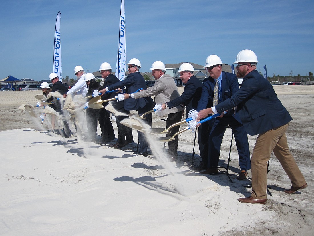 Brian Hartz. TouchPoint Medical executives and local officials break ground on the company&#39;s new site in Odessa.