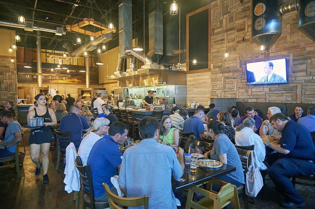 Courtesy. Craft beer and pizza restaurantÂ Oak & Stone will open its second Sarasota-areaÂ location this spring on Clark Road.Â