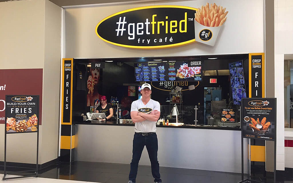 Florida Gulf Coast University graduate Chris Covelli is founder of #getfried Fry Cafe, which is opening a franchise location in University Village Shops in Estero.