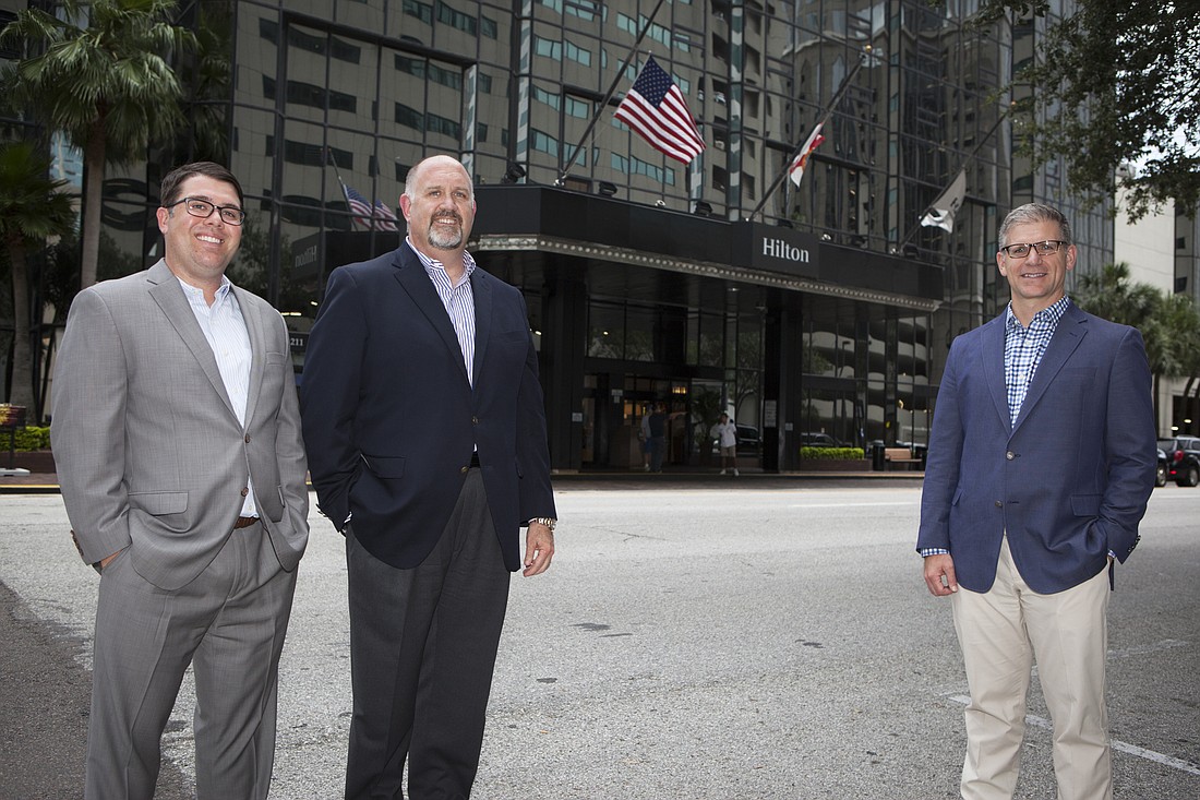 MARK WEMPLE â€” HFF&#39;s Preston Reid, Daniel Peek and Matt Mitchell anchor the brokerage&#39;s Tampa operation.