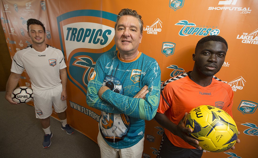 CALVIN KNIGHT. Defender Fernando Machado with longtime soccer executive Chris Economides, who joined the Florida Tropics in 2016, and midfielder Melvin Boating.