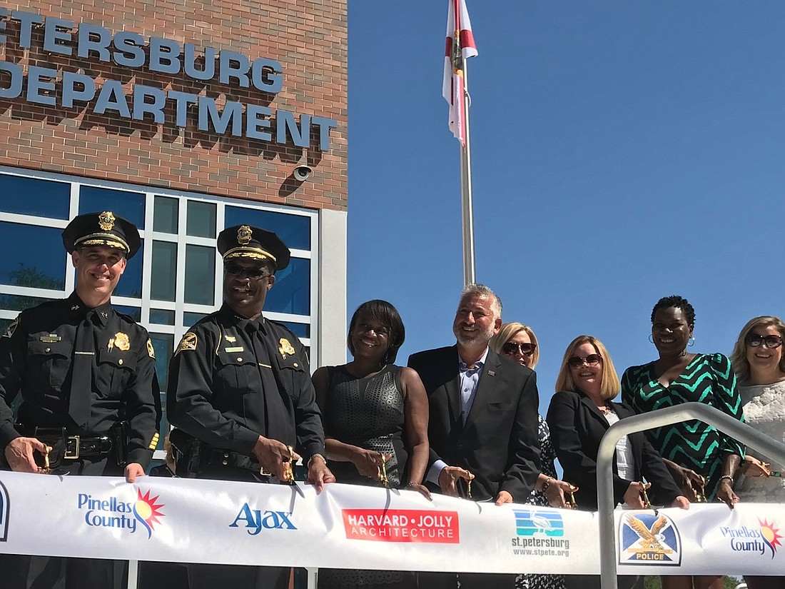 Assistant St. Petersburg Police Chief Mike Kovacsev, Chief Anthony Holloway, Deputy Mayor Kanika Tomalin, Mayor Rick Kriseman and St. PetersburCity Council members cut the ribbon to open the new police headquarters. Courtesy photo