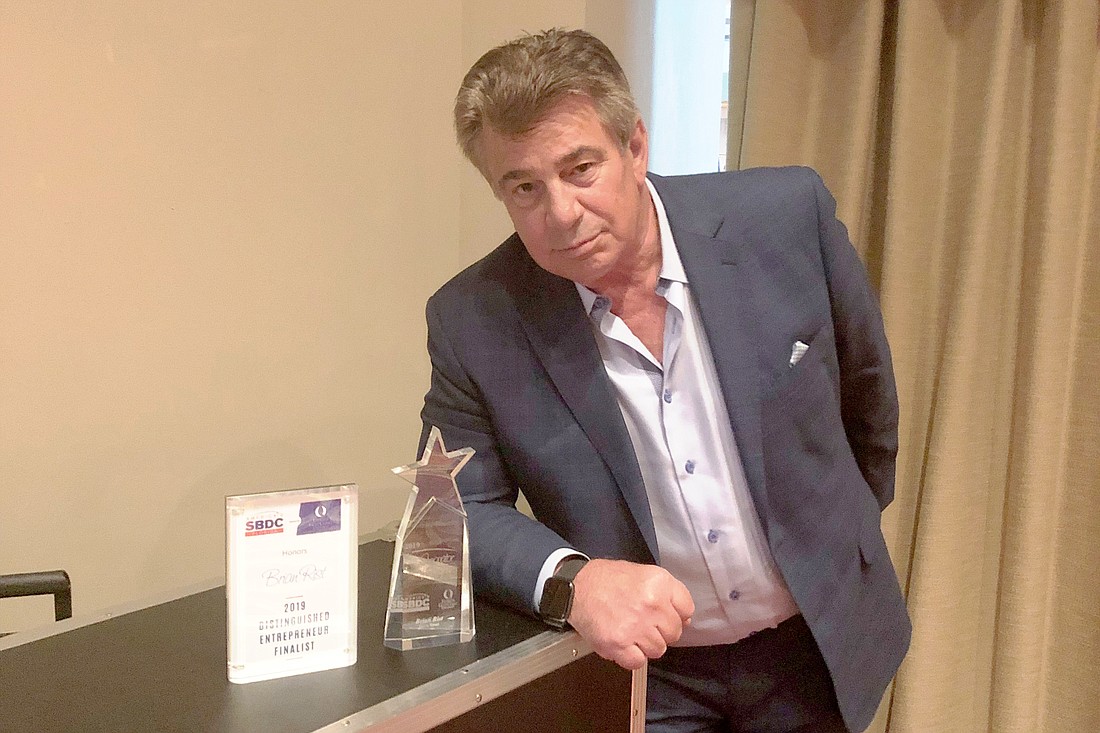 Storm Smart Executive Chairman Brian Rist was named the 2019 Distinguished Innovator of the Year by the Florida Small Business Development Center at Florida Gulf Coast University. Courtesy SBDC