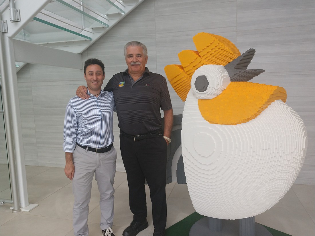 Courtesy. Luca Bonini, CEO of Italpollina, with Horticultural Alliance founder James Quinn at Italpollina&#39;s North American headquarters in Anderson, Ind.