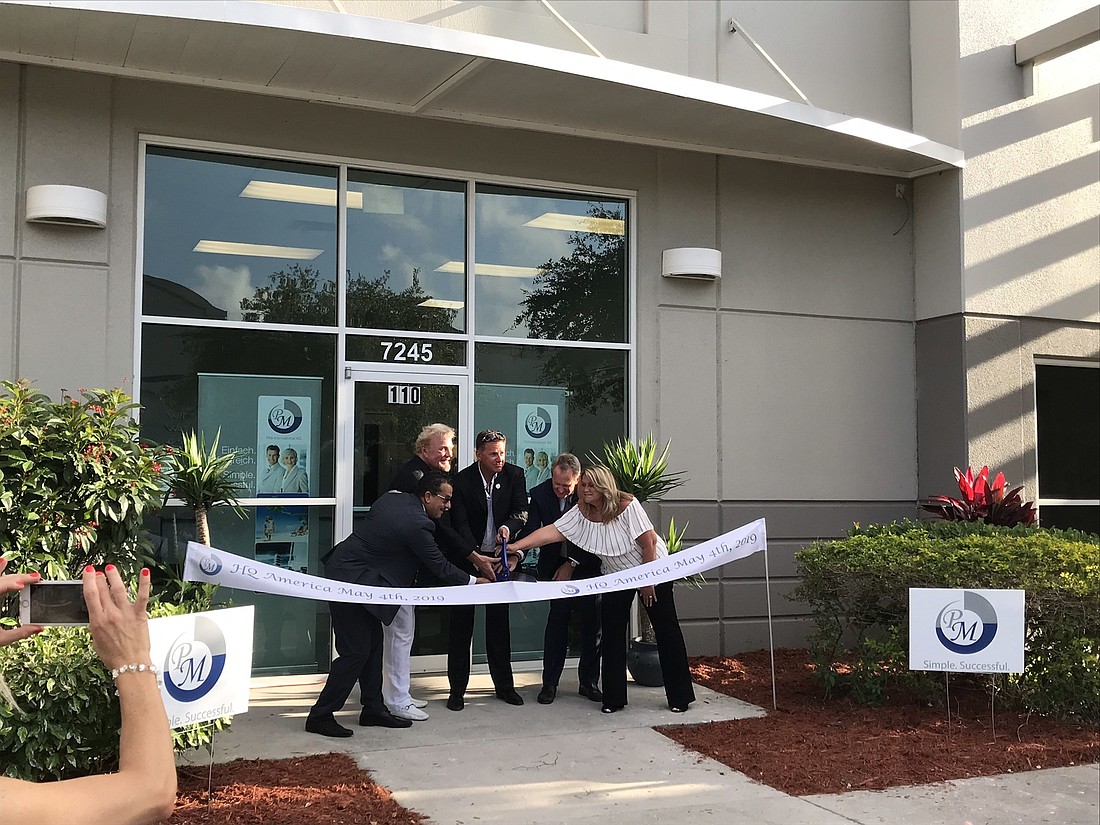 Courtesy. PM-International AG, aÂ direct sales company thatÂ develops and markets products through the brand FitLine, opened a new headquartersÂ for the Americas in south Manatee County,Â in the Sarasota-Bradenton Commerce Park.
