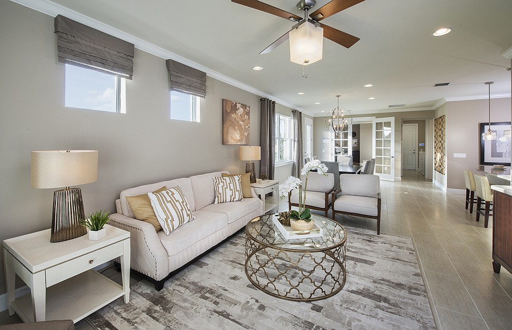 Family room of the Serenity model Pulte Homes will offer at Esplanade Lake Club in Fort Myers. Courtesy Pulte Homes